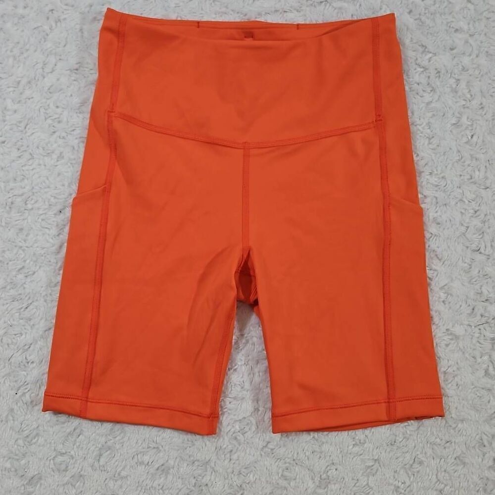 Athleta Orange Haze Ultimate Stash Pocket 7" Short women's XS bike compression